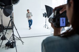 Male model posing for photographer