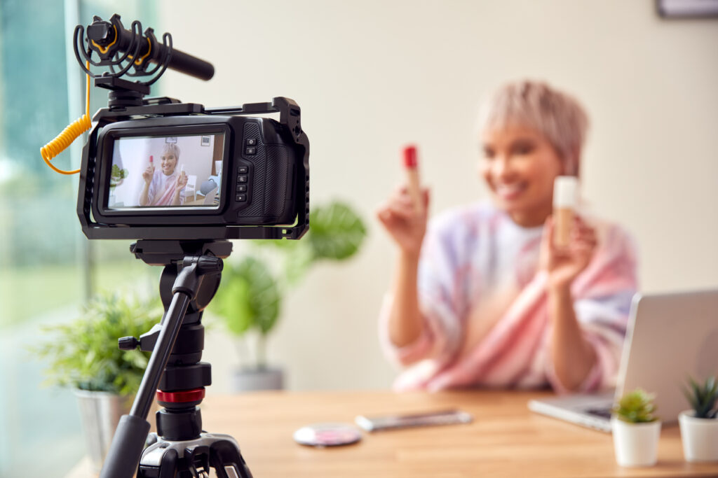 Female Vlogger Recording Beauty And Make Up Video At Home With Camera