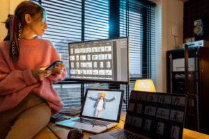 Photographer editing photos at home office